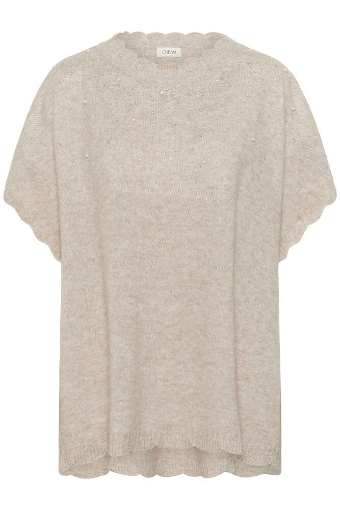 Beige knit top on a white background